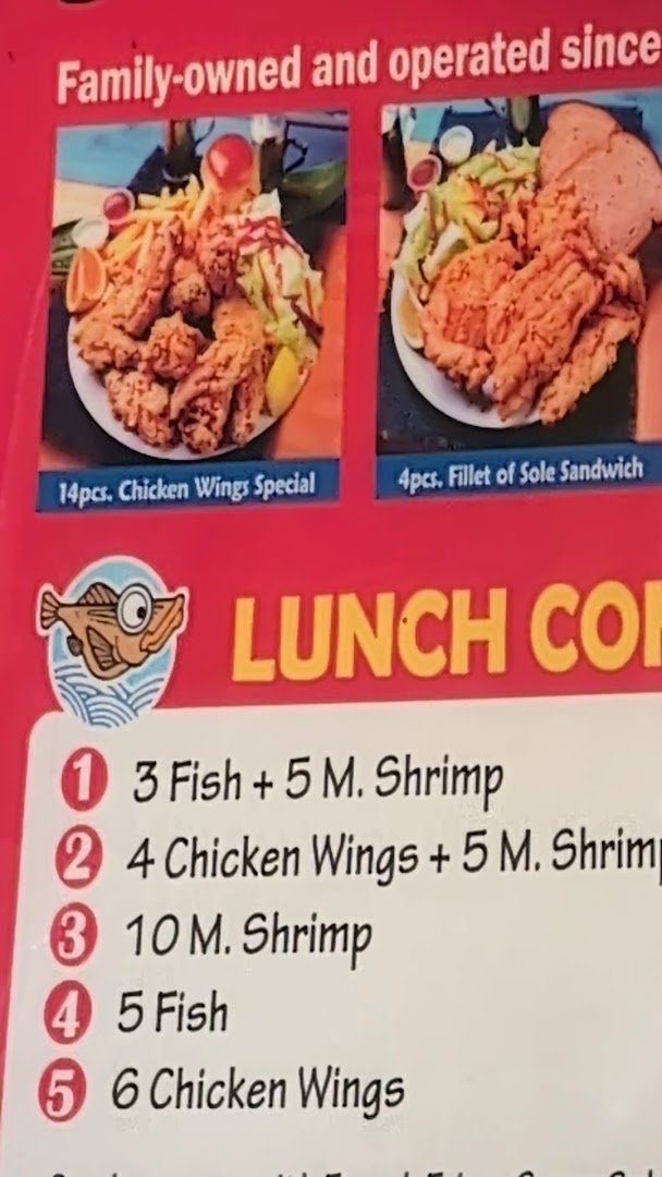 Takeaway containers beside a fish and chips counter.