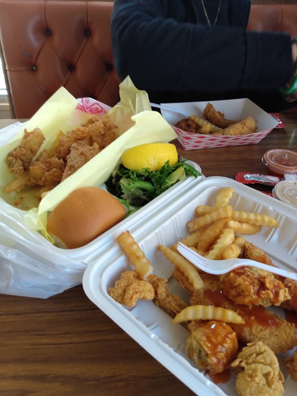 Printed menu showing chicken, fish, and shrimp.