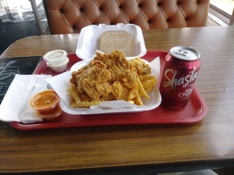Drinks and small plates listed on a menu.