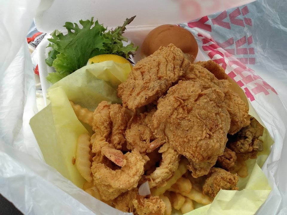Specials menu with catfish, snapper, and oysters.