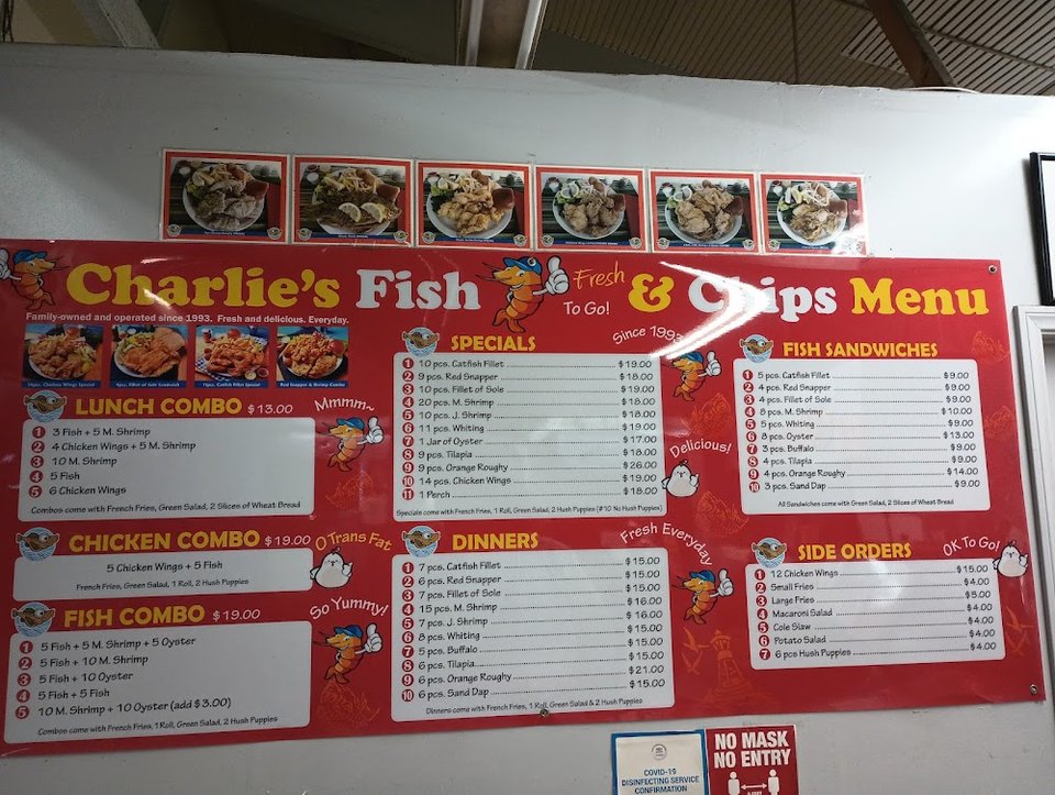 Printed menu showing chicken, fish, and shrimp.